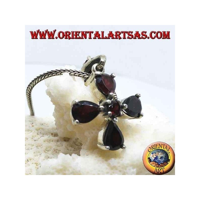 Silver pendant in the shape of a four-leaf clover with drop and round garnets