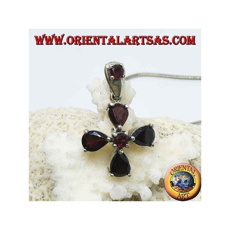 Silver pendant in the shape of a four-leaf clover with drop and round garnets