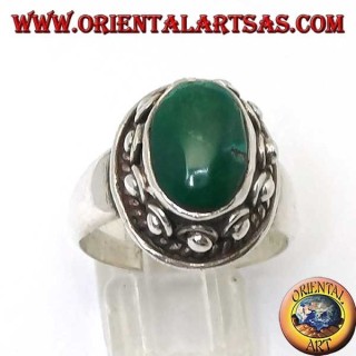 Anello in argento con borchie intorno al cassone, del Turchese antico naturale ovale