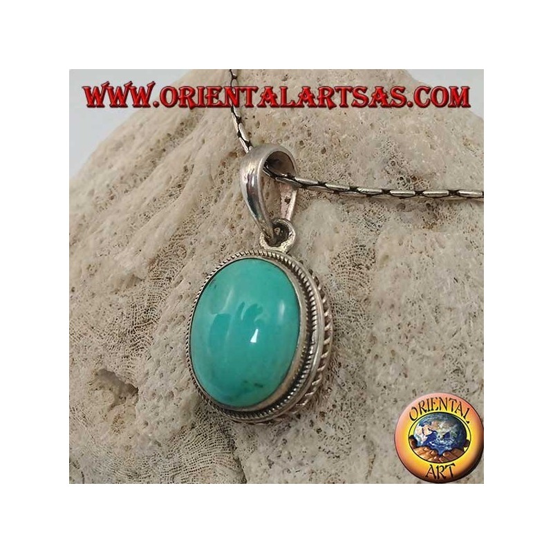 Silver pendant with oval natural turquoise and braided border