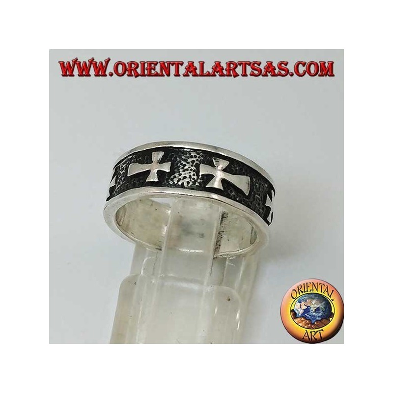 Silver record ring with bas-relief crosses