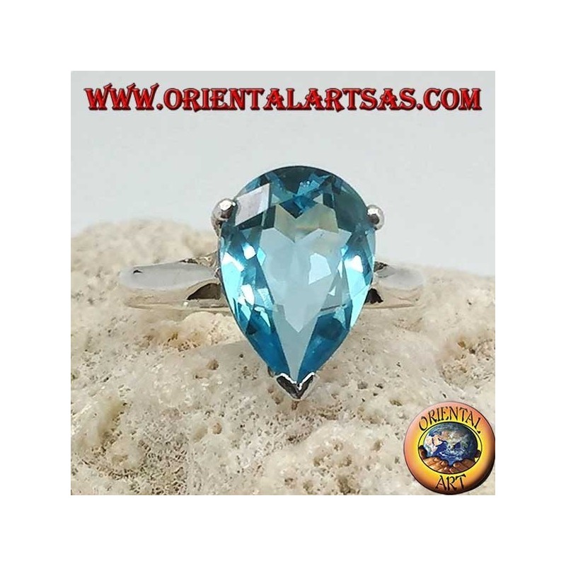 Silver ring with drop-shaped blue topaz with claw setting