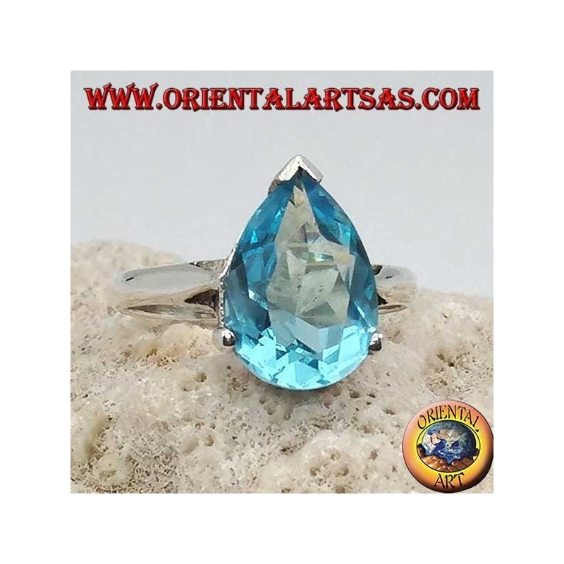 Silberring mit tropfenförmigem Blautopas mit Krallenfassung