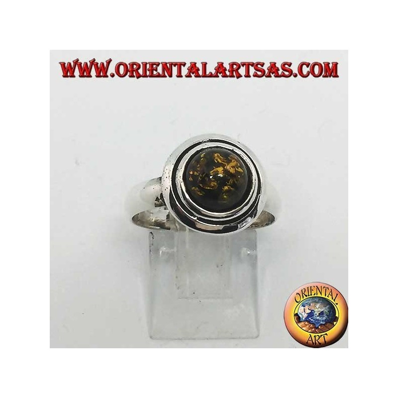Bague en argent avec ambre rond vert entouré de disques