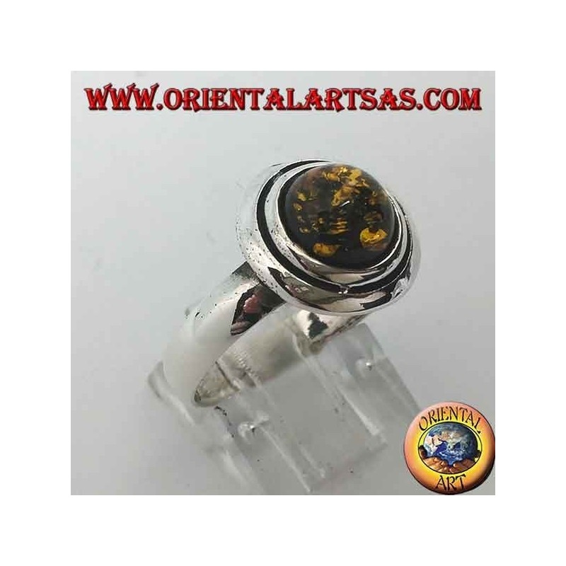 Anillo de plata con ámbar redondo verde abrazado por discos