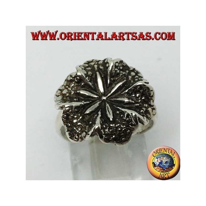 Silver ring in the shape of a lily flower, a symbol of purity