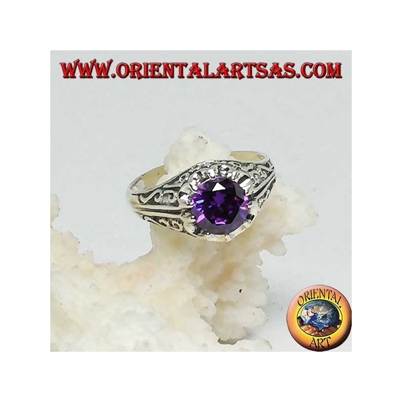 Anello in argento intarsiato con zircone color ametista incastonato 