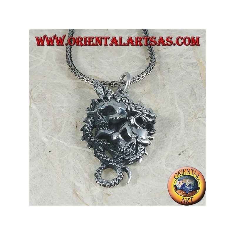 Colgante de plata con dos calaveras