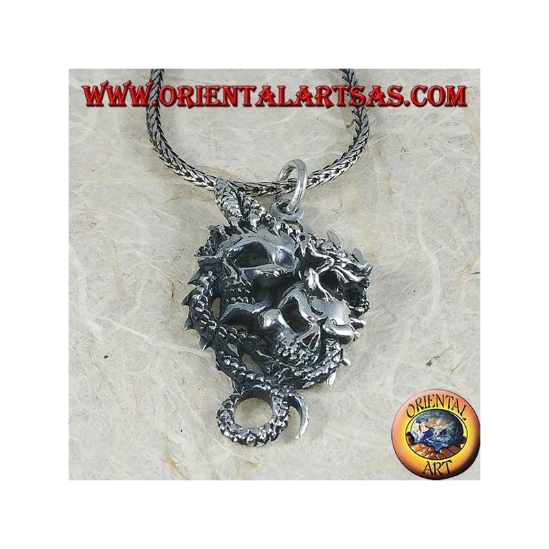 Colgante de plata con dos calaveras