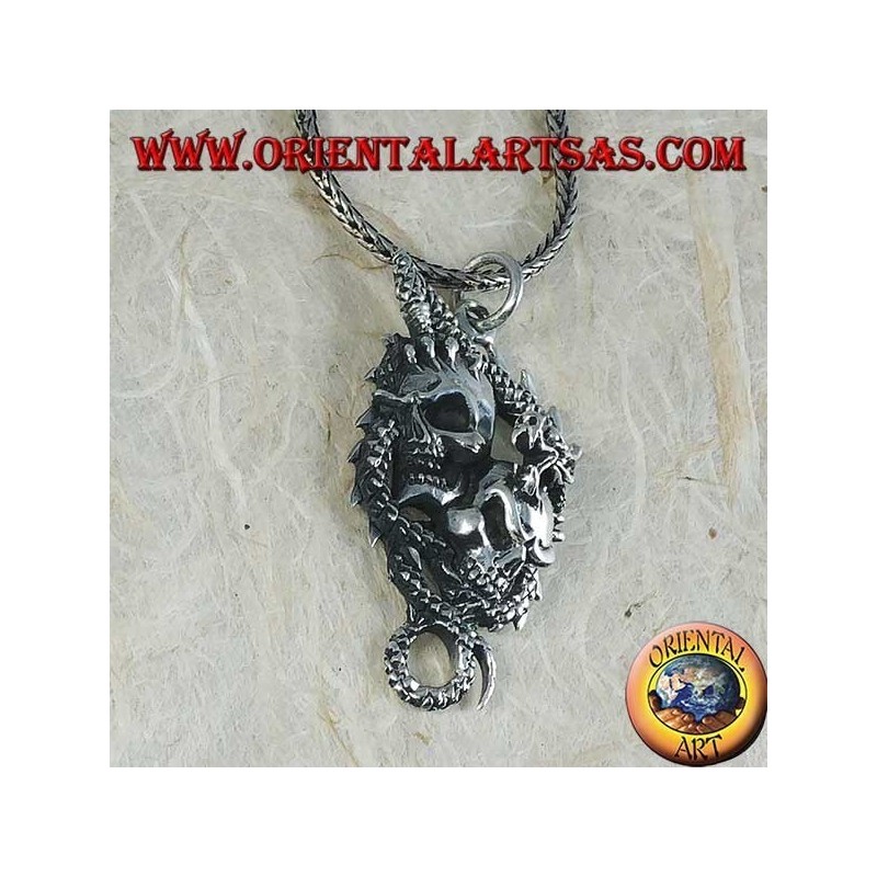 Colgante de plata con dos calaveras