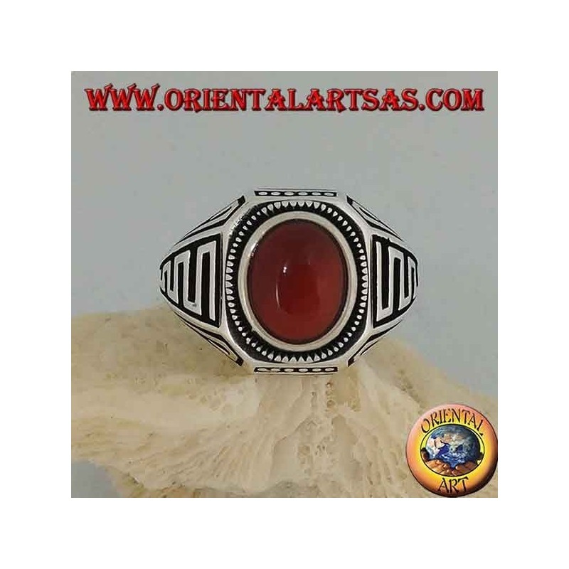 Silver ring with oval cabochon carnelian and waves in bas-relief on the sides