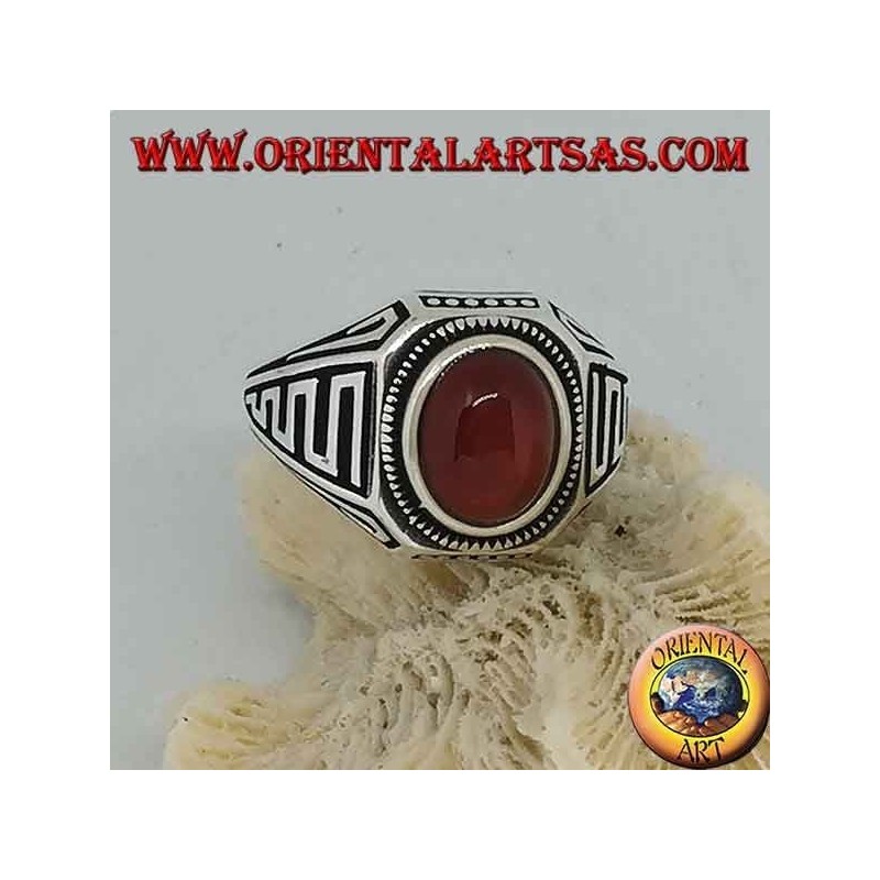 Silver ring with oval cabochon carnelian and waves in bas-relief on the sides