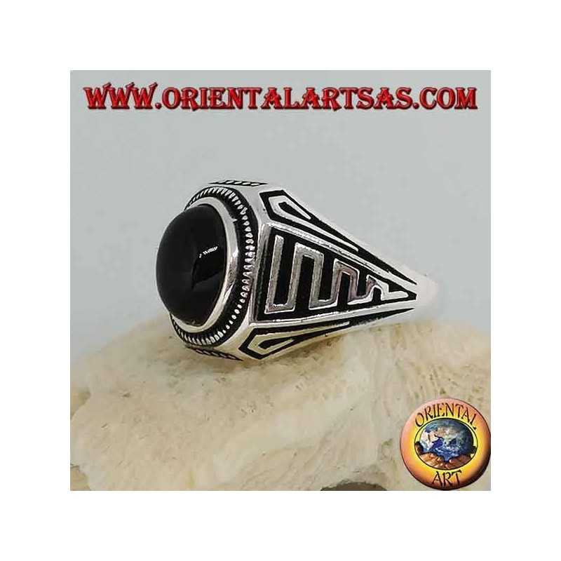 Silver ring with oval cabochon onyx and waves in bas-relief on the sides