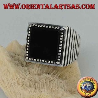 Silver ring with large square onyx, striped on the sides