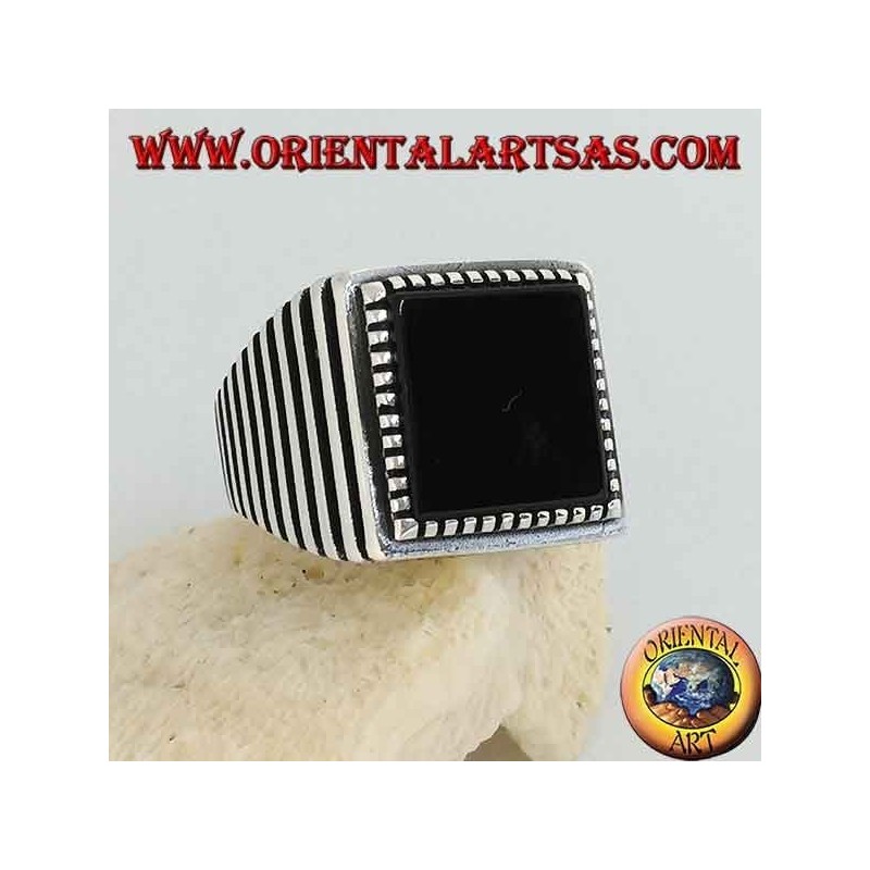 Silver ring with large square onyx, striped on the sides