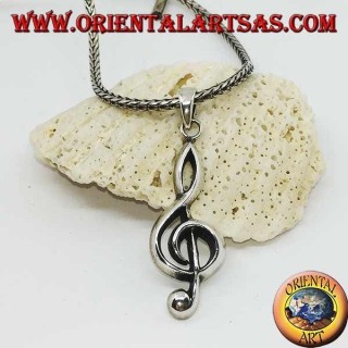 silver pendant treble clef or key of a large sun