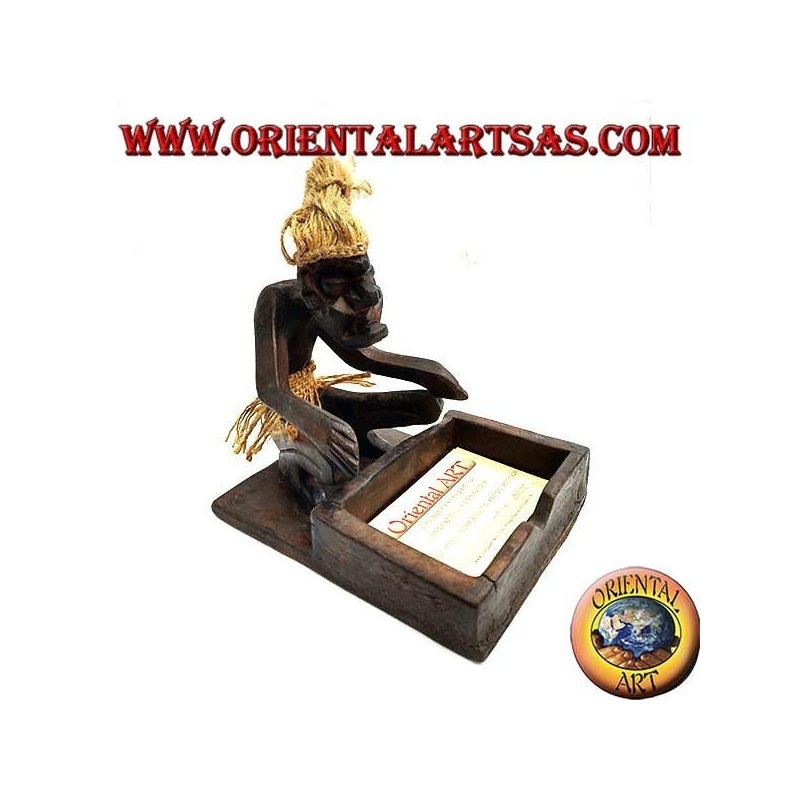 Business card holder with sculpture of a primitive man in teak wood