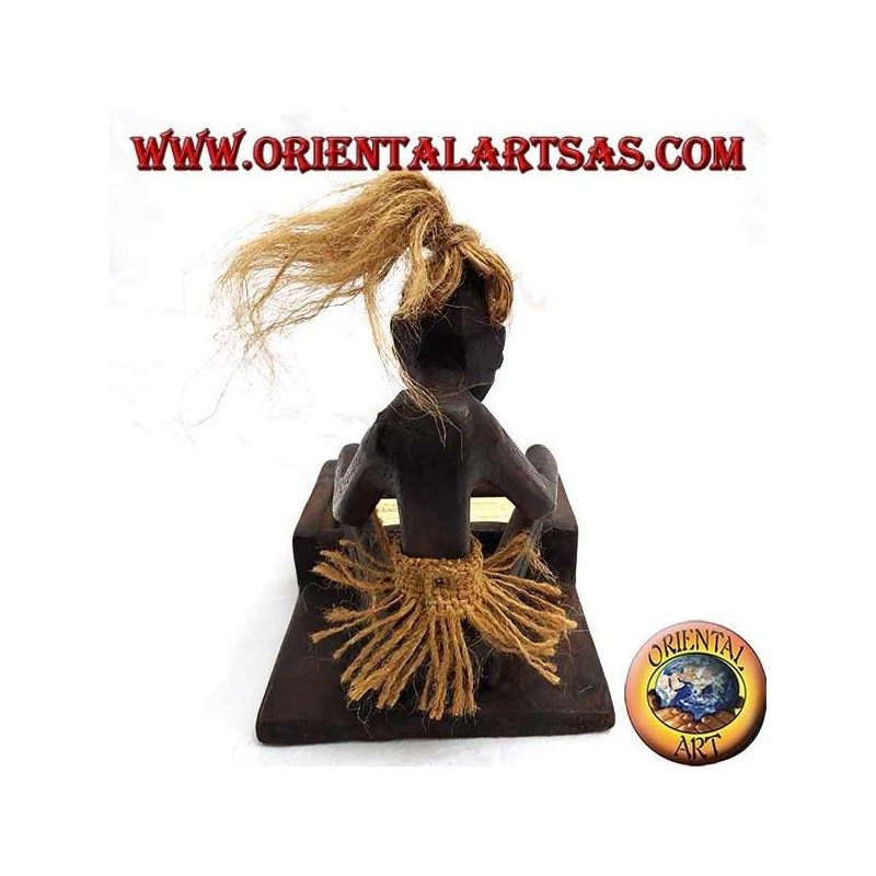 Business card holder with sculpture of a primitive man in teak wood