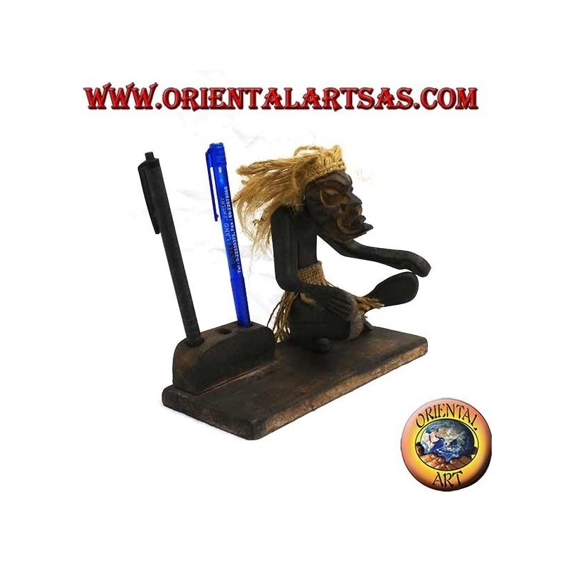 Pen holder with sculpture of a primitive man in teak wood