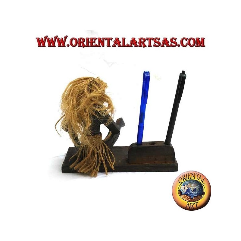 Pen holder with sculpture of a primitive man in teak wood
