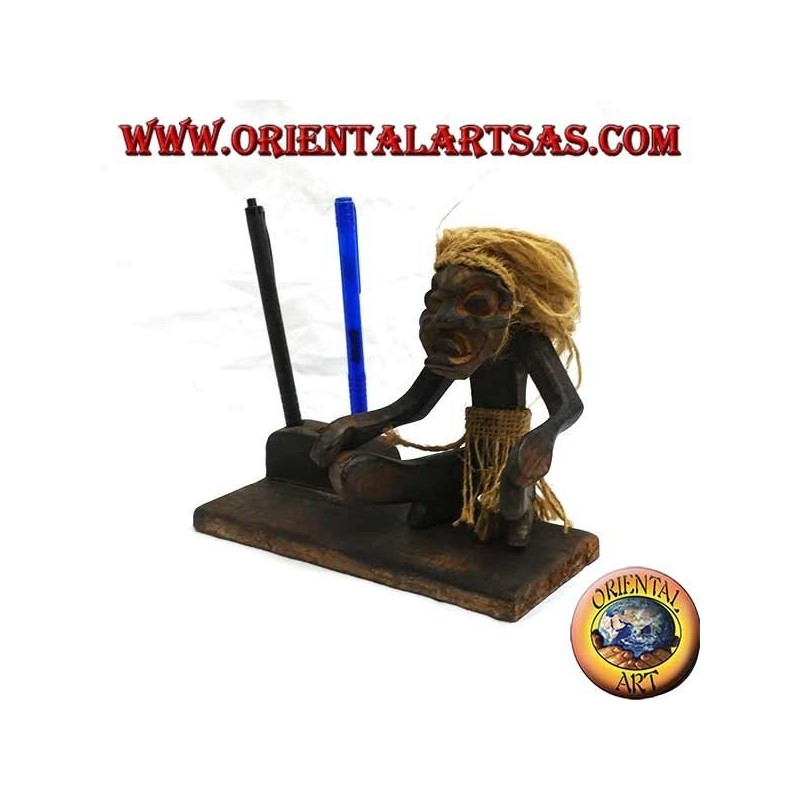 Pen holder with sculpture of a primitive man in teak wood