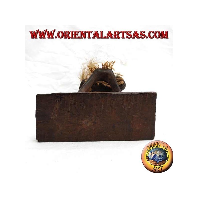 Sculpture of a primitive man guitarist in teak wood