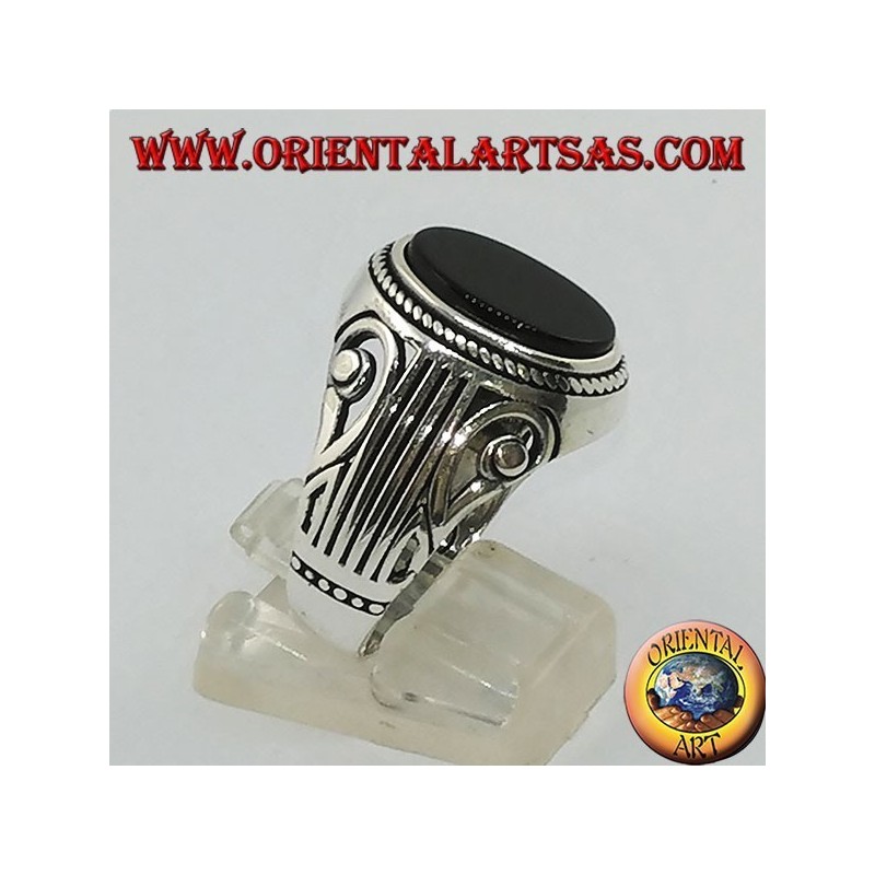 Silver ring with flat oval onyx and a Lira (harp) carved on the sides