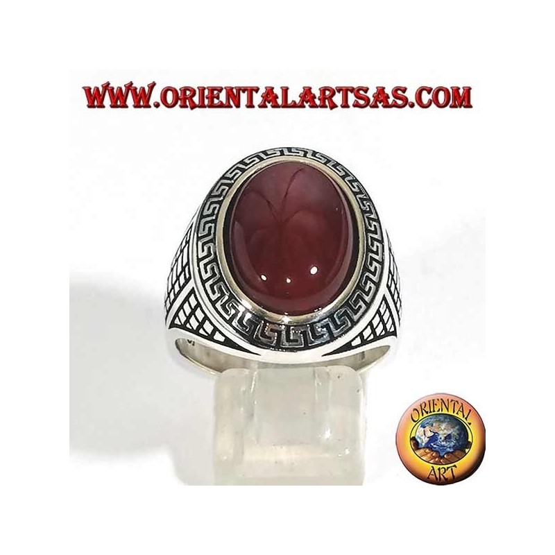 Silver ring with large oval carnelian surrounded by a Greek relief