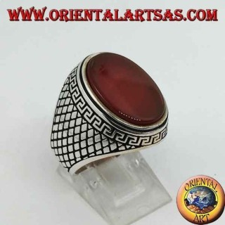 Silver ring with large flat oval carnelian surrounded by a Greek relief