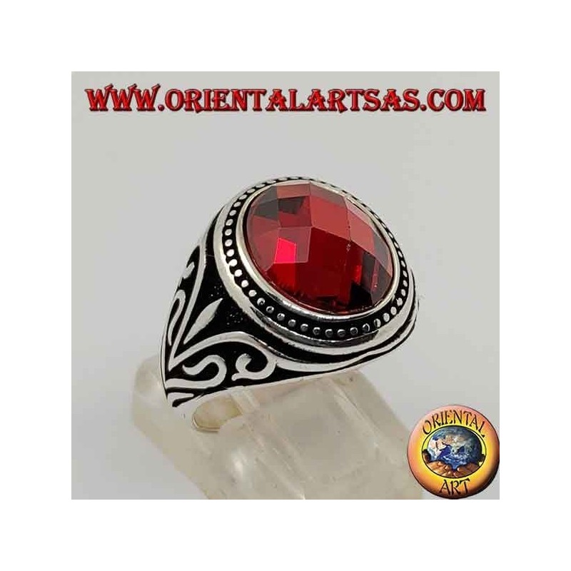 Silver ring with cabochon faceted synthetic garnet with side decorations