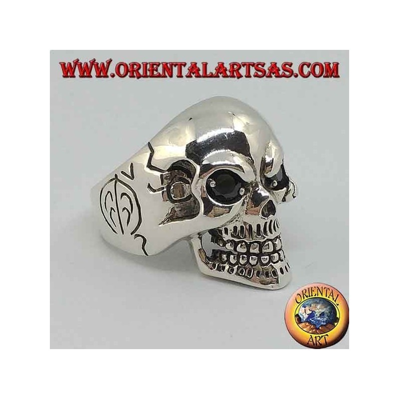 Silver skull ring with black spinel eyes