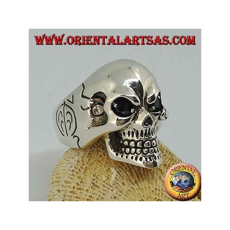 Silver skull ring with black spinel eyes