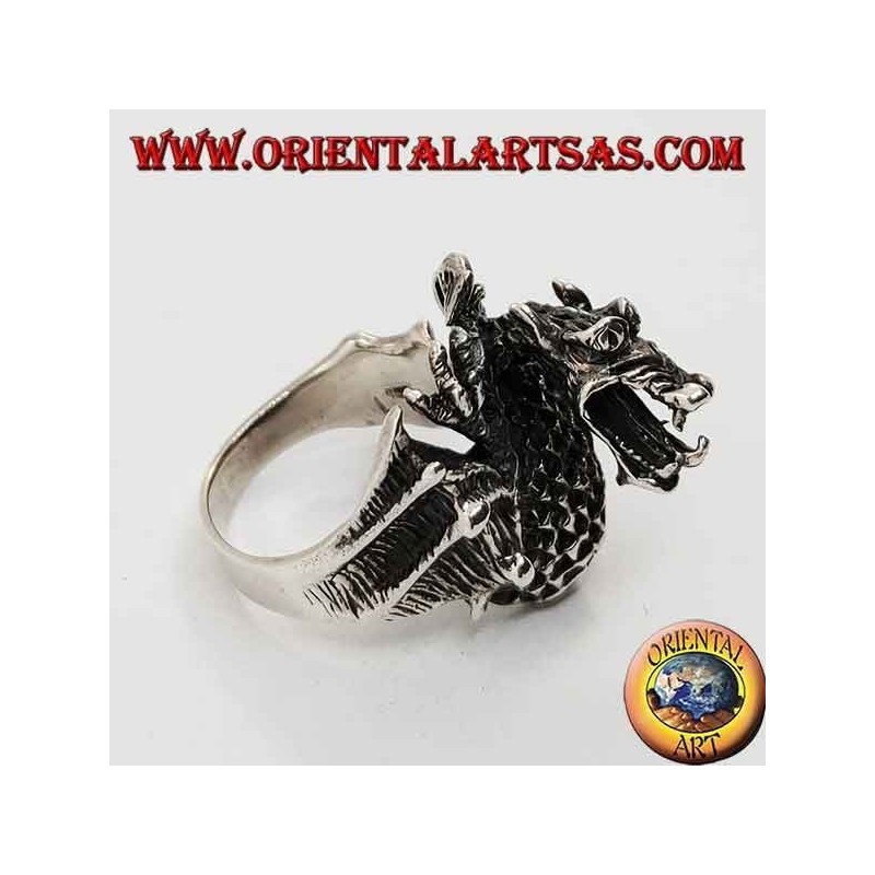 Silver ring in the shape of a dragon flamethrower