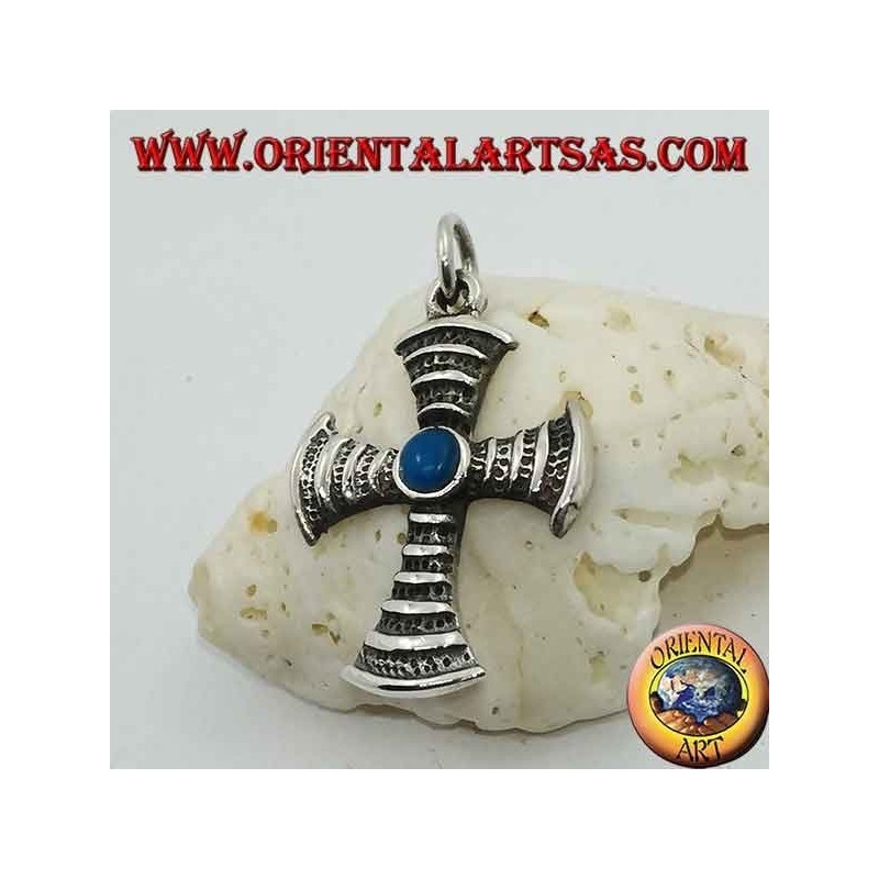 Cross-shaped silver pendant with central round turquoise