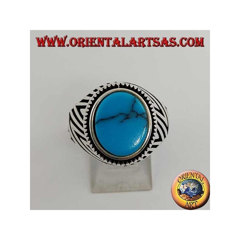 Silver ring with flat oval turquoise and engravings engraved on the sides