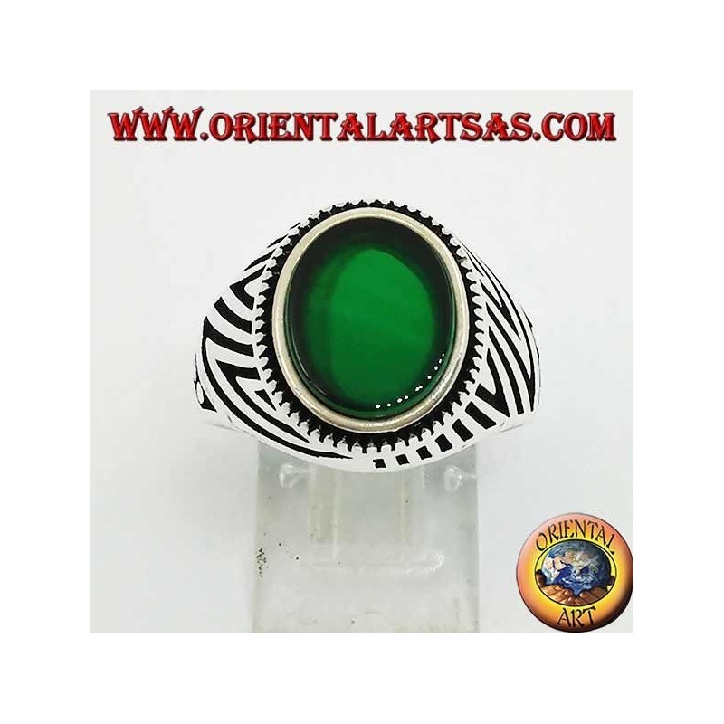 Silver ring with flat oval green agate and engravings engraved on the sides