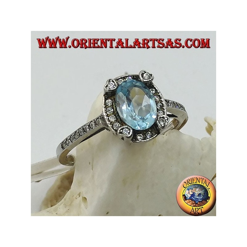 Bague en argent avec topaze bleue ovale naturelle sertie de zircons
