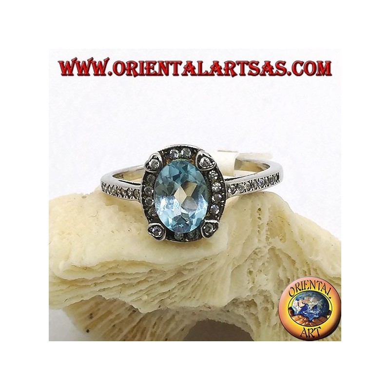 Bague en argent avec topaze bleue ovale naturelle sertie de zircons