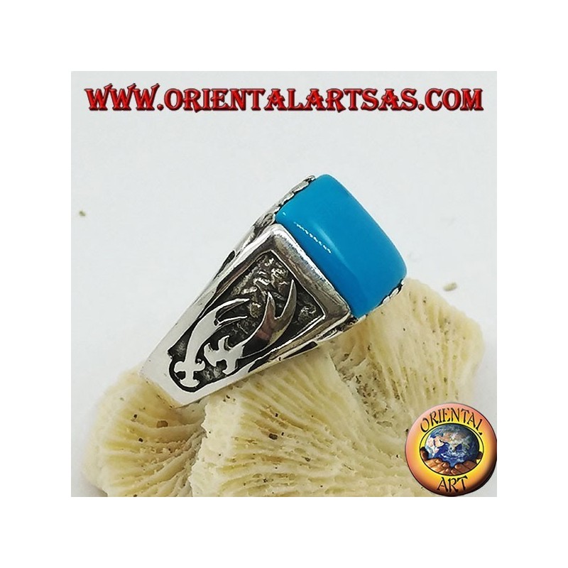 Silver ring with rectangular turquoise and high relief Zulfiqar scimitars on the sides