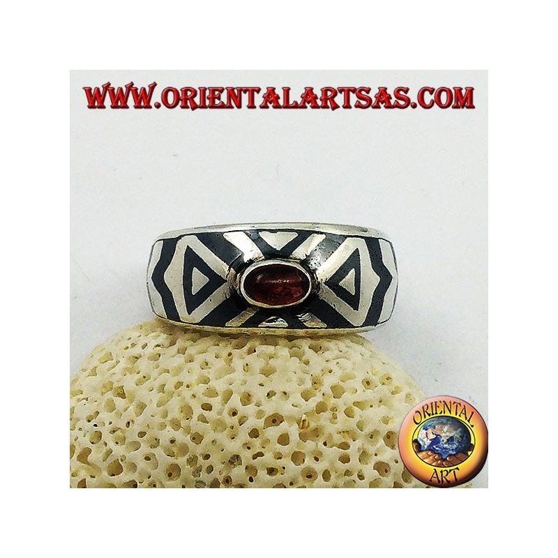 Rounded silver ring with oval garnet and niello decoration