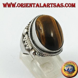 Anello in argento con occhio di tigre ovale a cabochon e decorazioni indiane