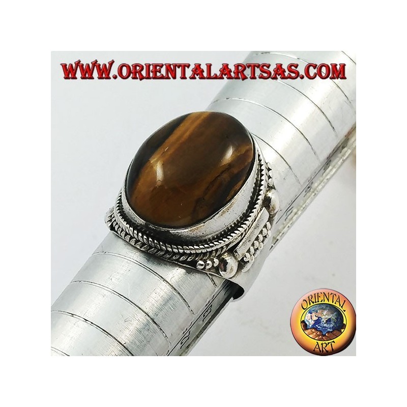 Bague en argent avec cabochon ovale oeil de tigre et décorations indiennes