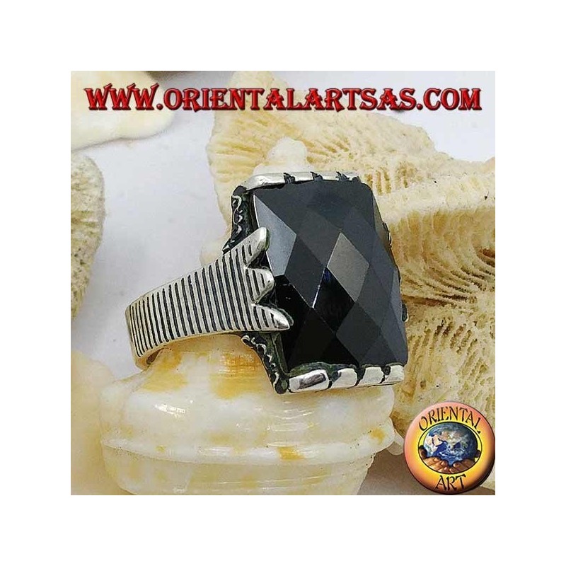Silver ring with faceted rectangular onyx and clip frame