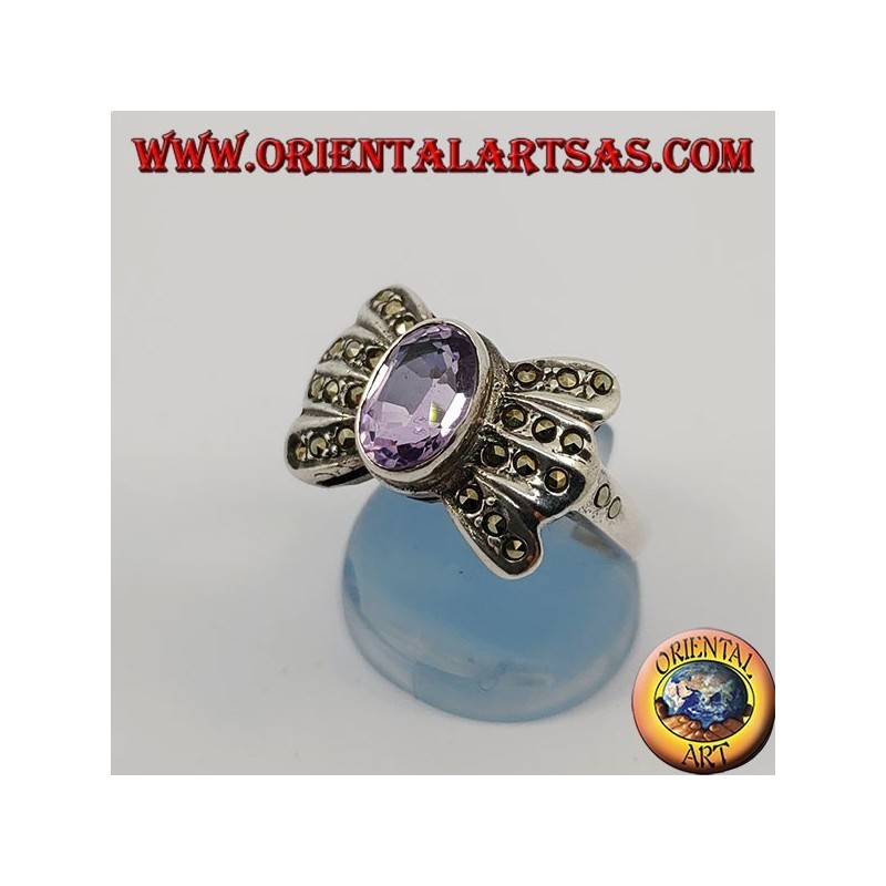 Silver bow ring with natural oval amethyst surrounded by marcasite