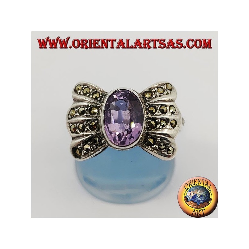 Silver bow ring with natural oval amethyst surrounded by marcasite