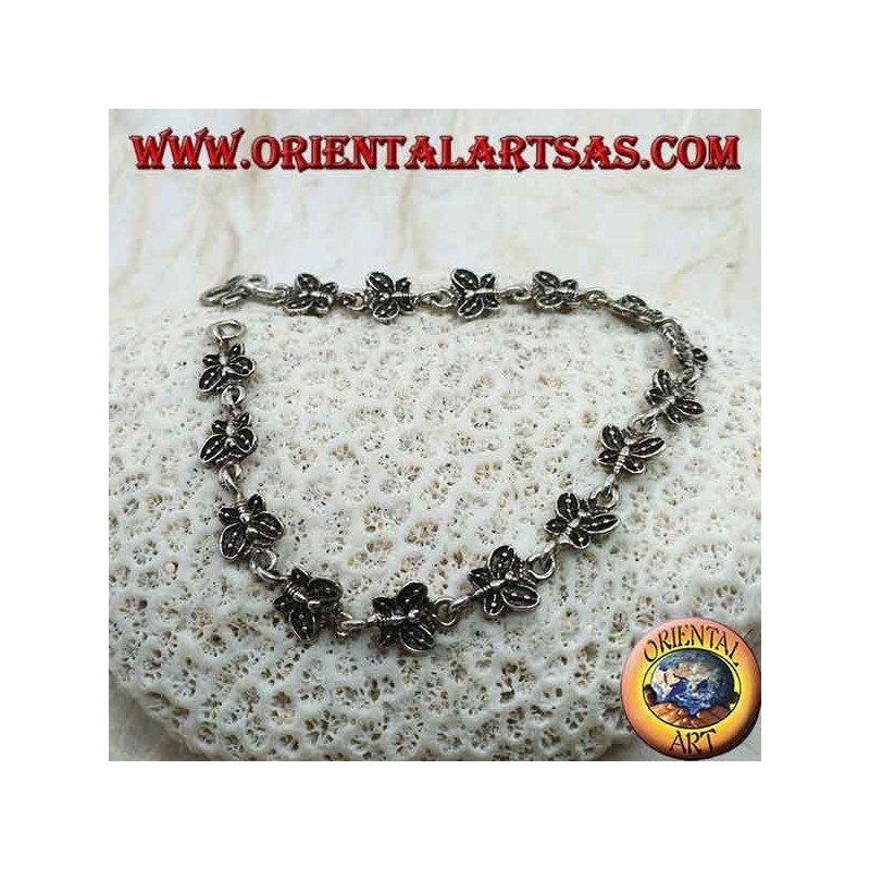 Pulsera de plata suave con 15 mariposas.