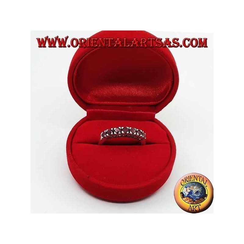 Band silver ring with a row of round rubies set