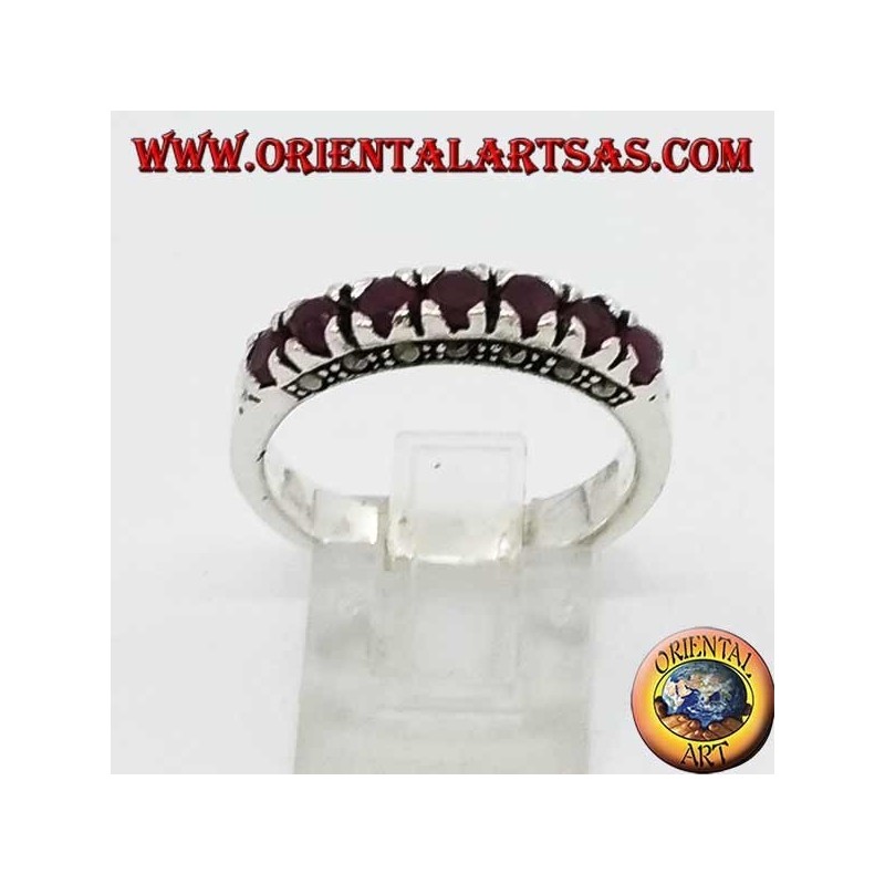 Band silver ring with a row of round rubies set