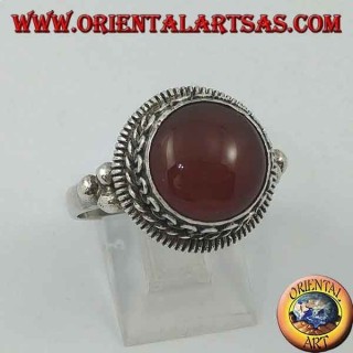 Silver ring with raised round carnelian and stripes and continuous serpentine on the sides