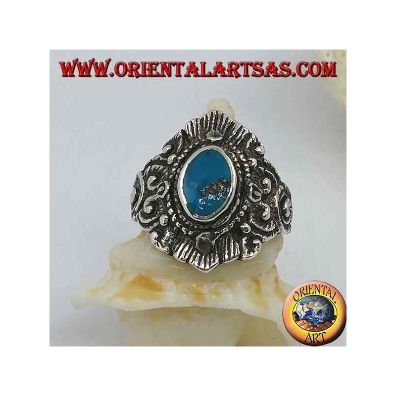 Silver ring with oval turquoise and Nepalese-style decorations